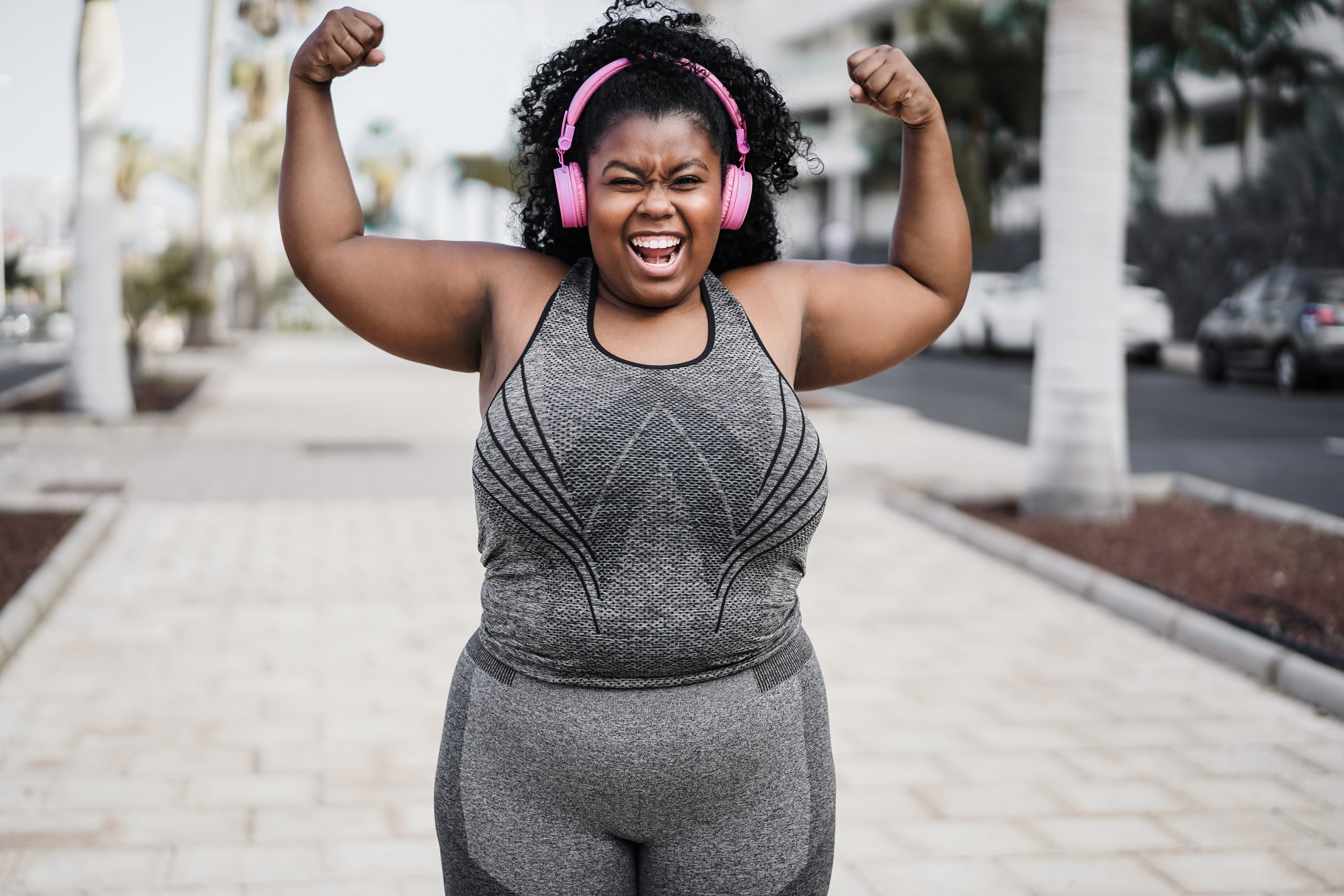 Happy,Curvy,African,Woman,Doing,Workout,Routine,Outdoor,At,City