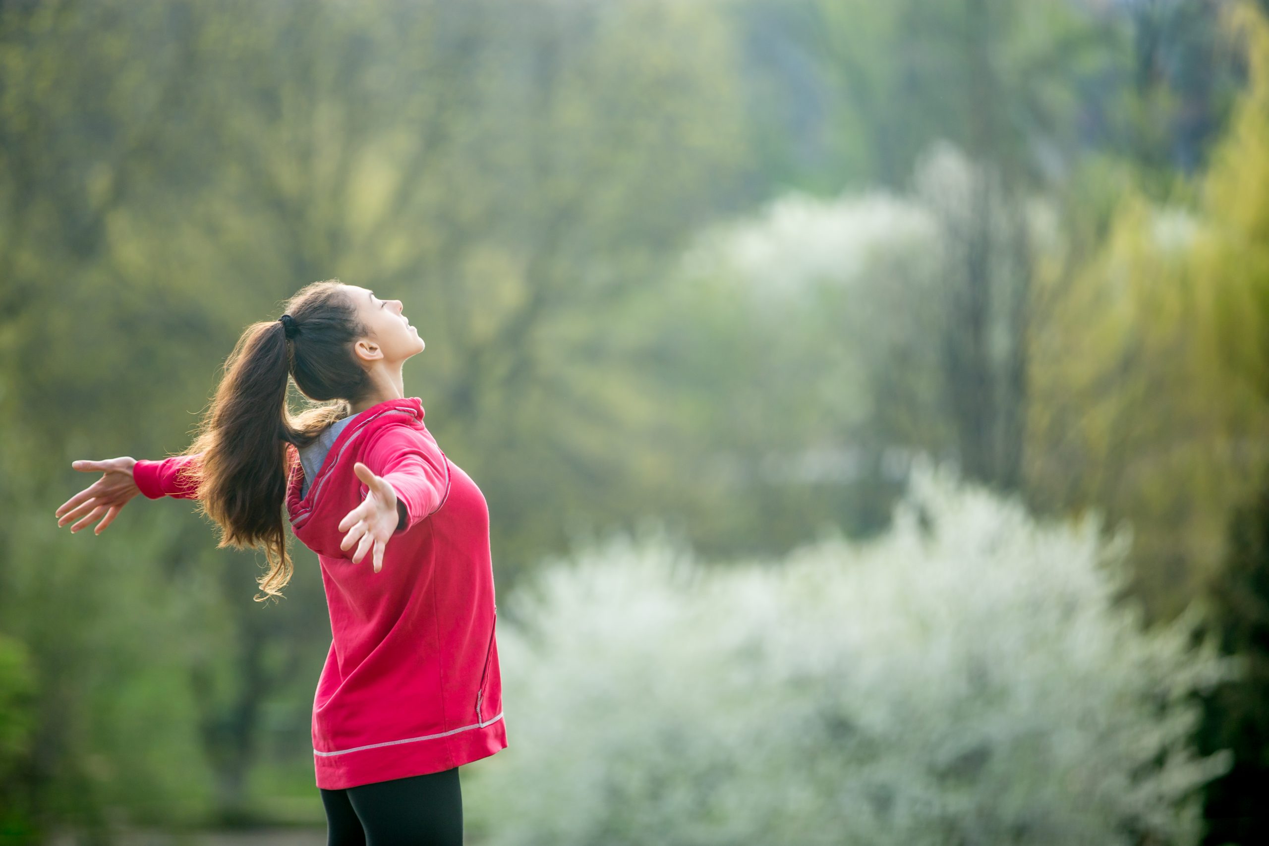 Profile,Portrait,Of,Happy,Sporty,Woman,Relaxing,In,Park.,Joyful